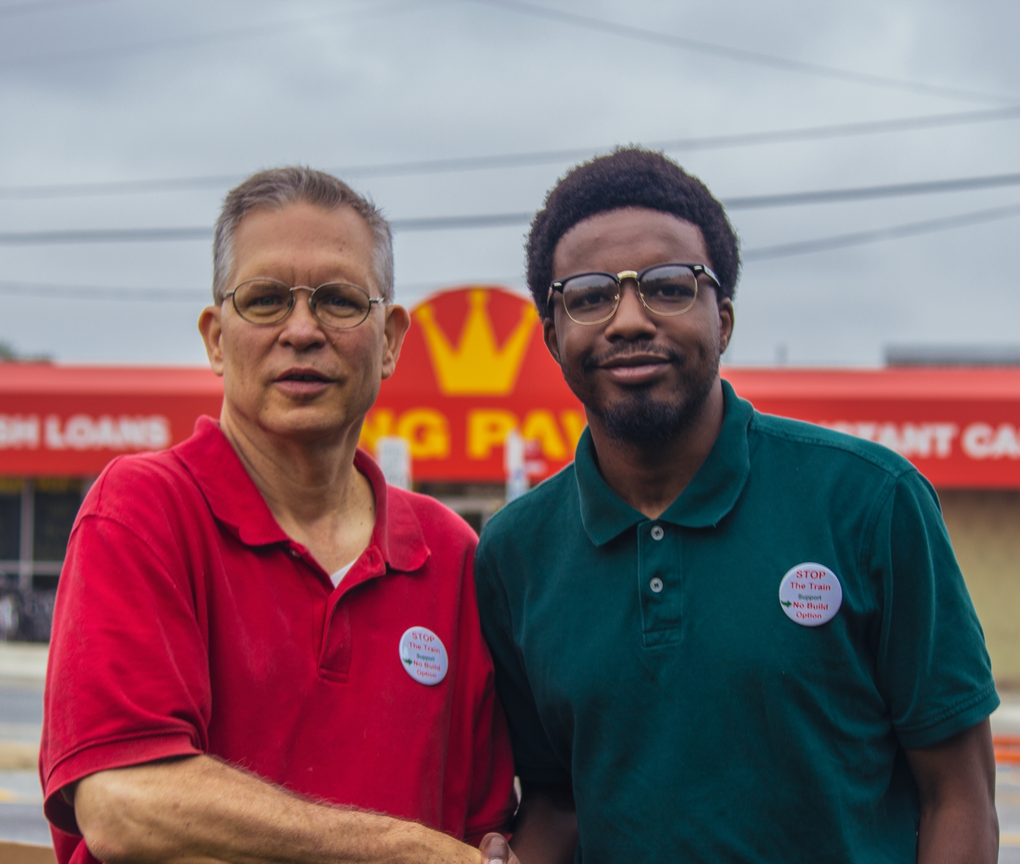 Greenbelt Advocates co-head Brian Almquist shakes hands with Greenbelt City Councilman Colin Byrd at an anti-maglev rally in Bladensburg.